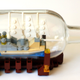 Illustration for article titled Did you know you can build Lego ships inside bottles too?
